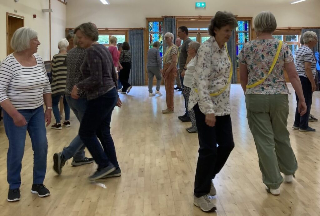 Dancers learning a Hey for 3